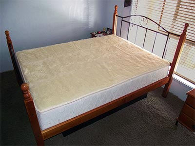Regular frame bed converted to waterbed
